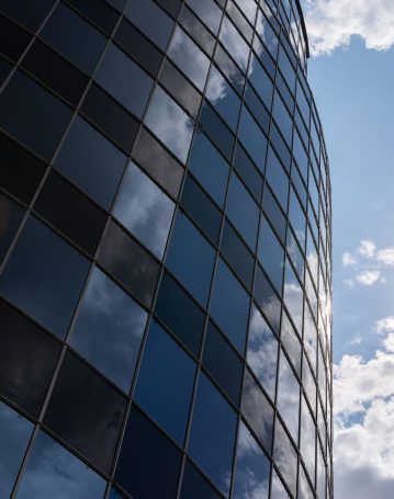 low-angle-view-of-modern-glass-building-facade-in-2025-02-12-18-41-19-utc